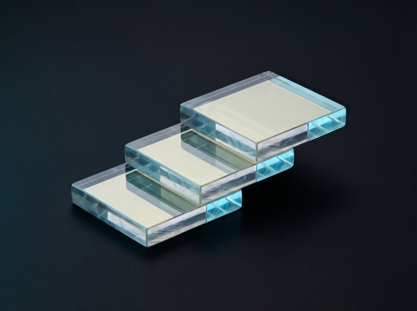 PMN-PT single-crystal boule under controlled lighting